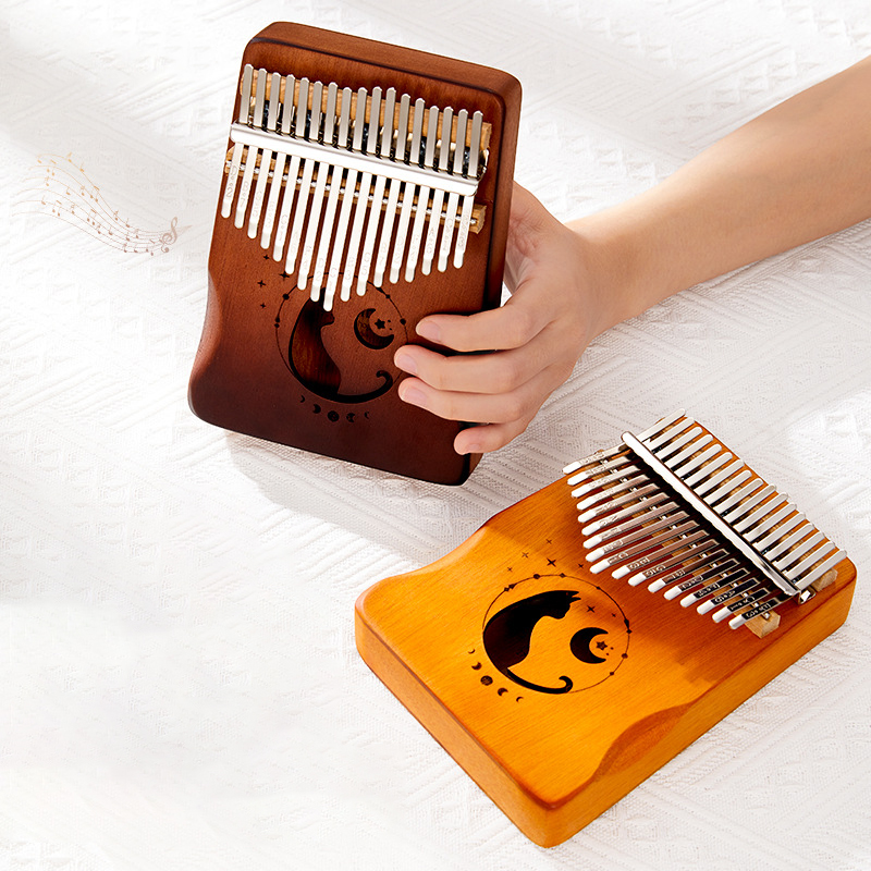 Kalimba de 17 teclas, diseño d - Musical Instrument Book reseña y precio
