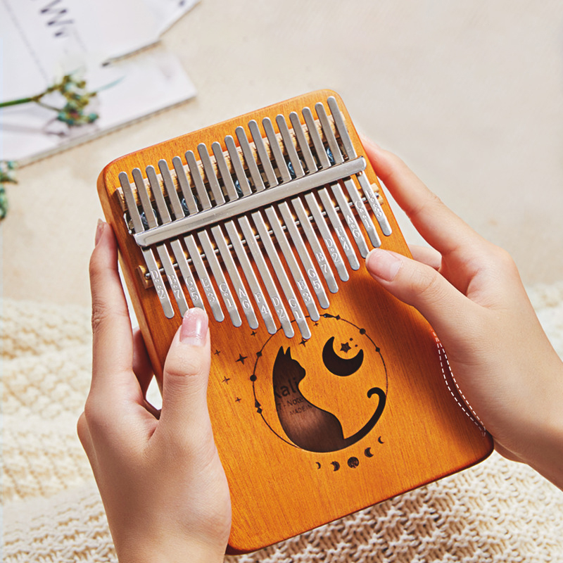 Kalimba de 17 teclas, diseño d - Musical Instrument Book reseña y precio